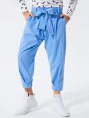 INCERUN Men Pants Fashion Solid Color Bow Knot Trousers Men Streetwear Elastic Waist Harem Pants